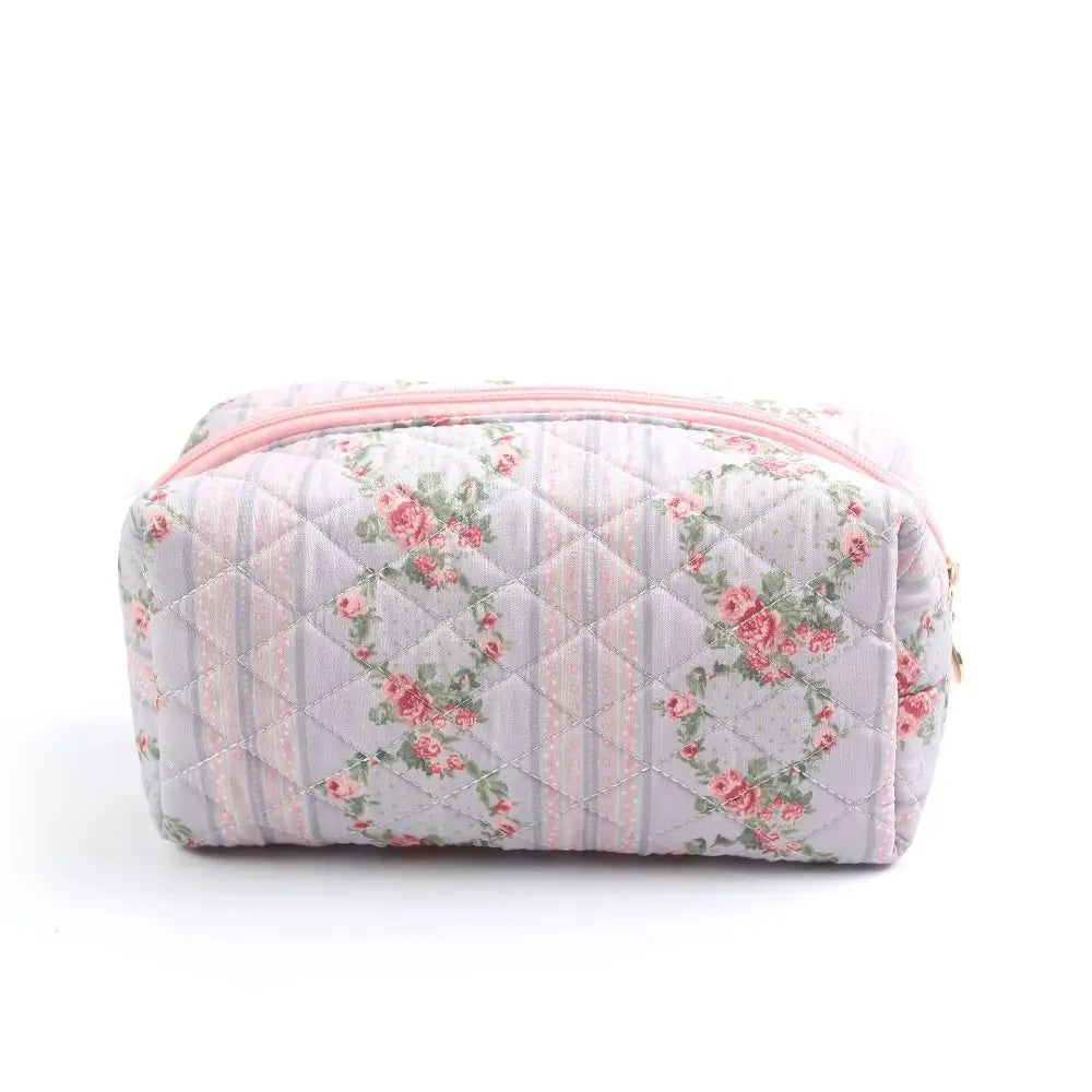 Clara | Trousse de maquillage matelassée à fleurs