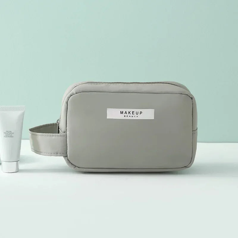 Organisateur de maquillage et de toilette spacieux et imperméable avec design en riz